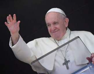 Pope waves from balcony